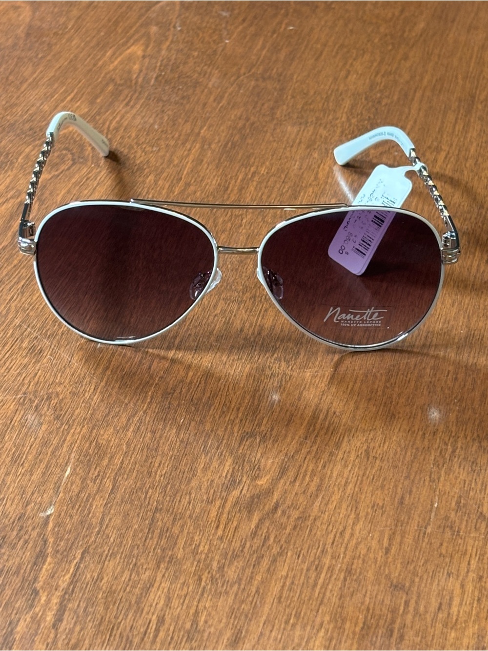 Nanette Lepore Silver Frame Sunglasses with Gradient Plum Lenses